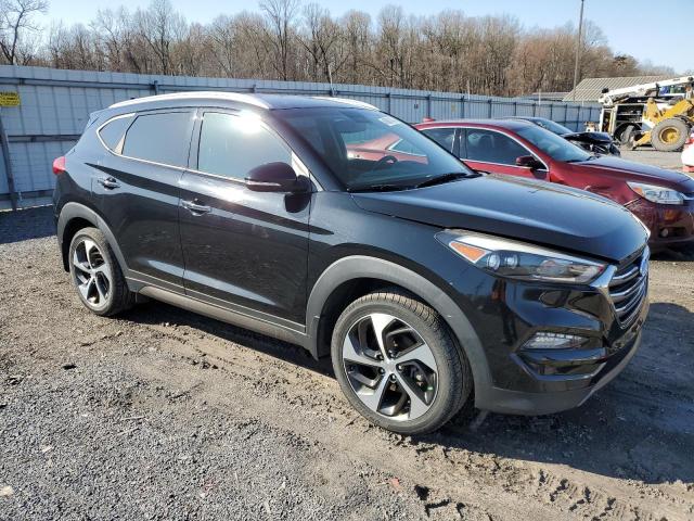 KM8J3CA22GU025736 - 2016 HYUNDAI TUCSON LIMITED BLACK photo 4