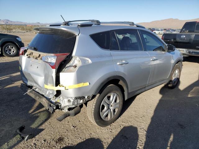 2T3ZFREV6EW073472 - 2014 TOYOTA RAV4 LE SILVER photo 3