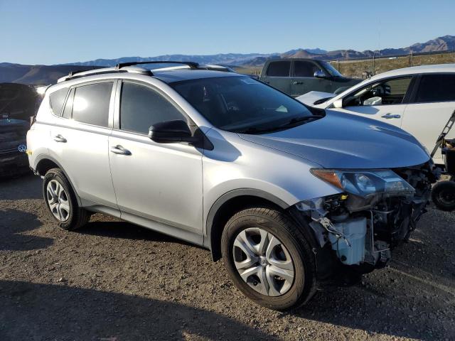 2T3ZFREV6EW073472 - 2014 TOYOTA RAV4 LE SILVER photo 4