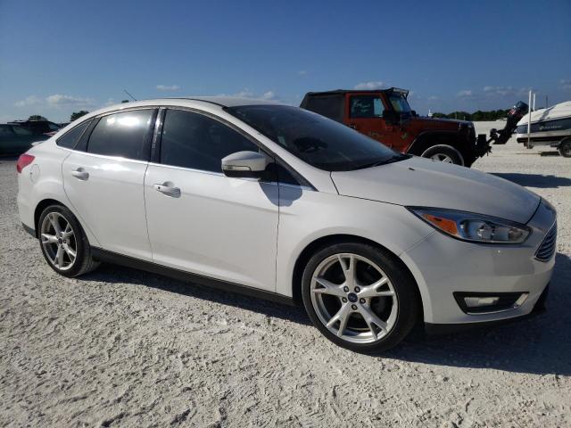 1FADP3J29GL381909 - 2016 FORD FOCUS TITANIUM WHITE photo 4