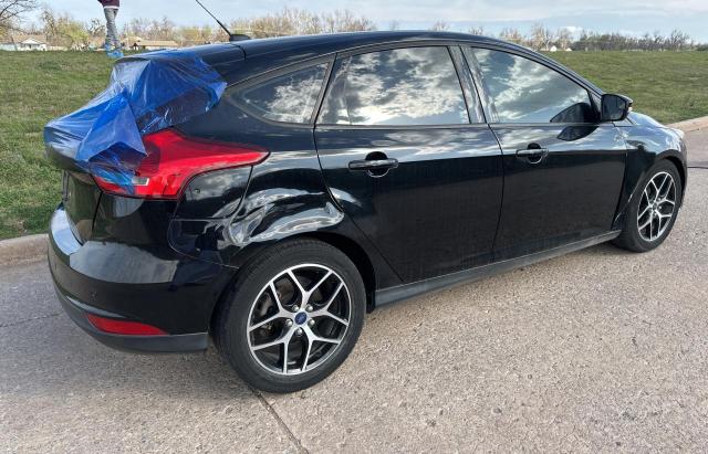 1FADP3M24JL272079 - 2018 FORD FOCUS SEL BLACK photo 4