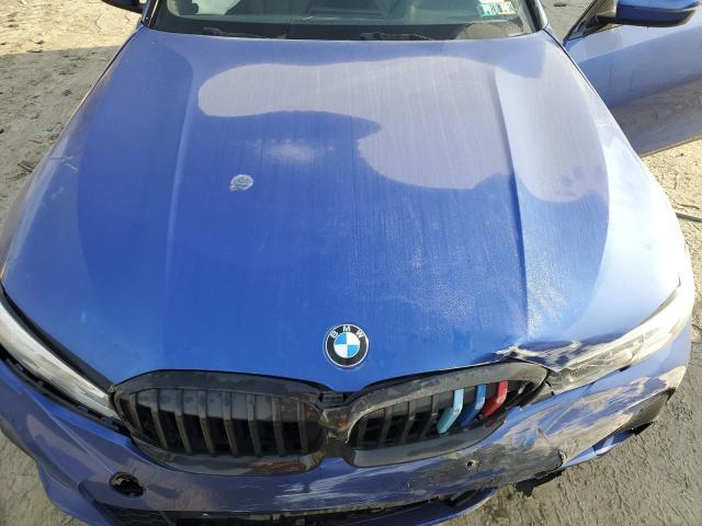 WBA5R7C06LFH42906 - 2020 BMW 330XI BLUE photo 11