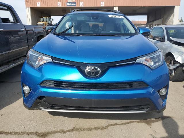 JTMRFREV6JJ204005 - 2018 TOYOTA RAV4 ADVENTURE BLUE photo 5