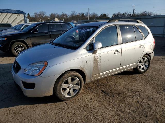 KNAFG529497284944 - 2009 KIA RONDO BASE SILVER photo 1