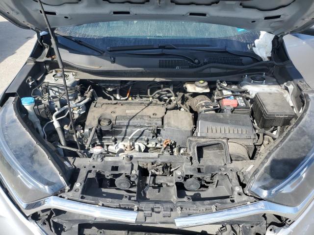 2HKRW5H34KH418648 - 2019 HONDA CR-V LX SILVER photo 12