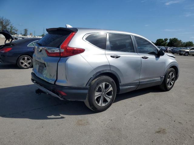 2HKRW5H34KH418648 - 2019 HONDA CR-V LX SILVER photo 3