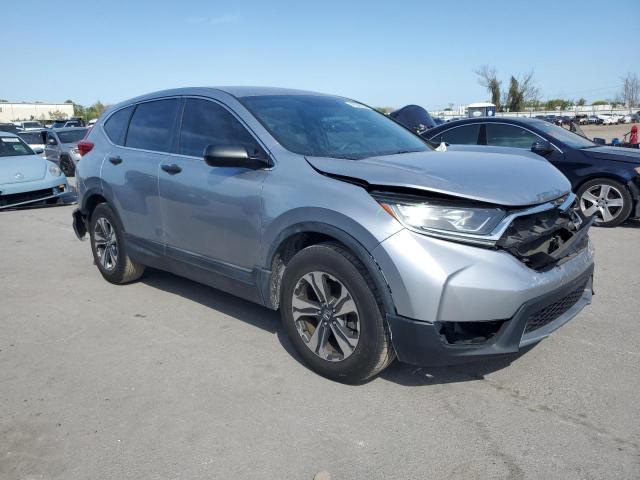 2HKRW5H34KH418648 - 2019 HONDA CR-V LX SILVER photo 4