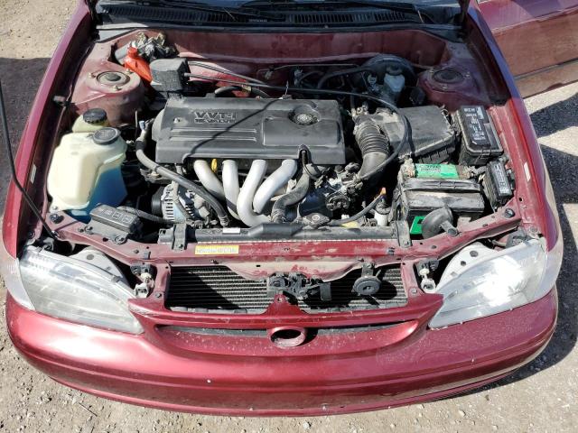 1NXBR12E8YZ413569 - 2000 TOYOTA COROLLA VE RED photo 11