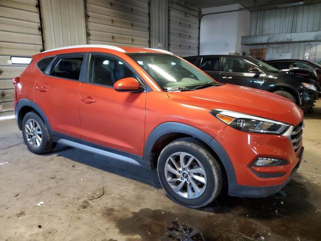 KM8J33A44HU274509 - 2017 HYUNDAI TUCSON LIMITED ORANGE photo 4