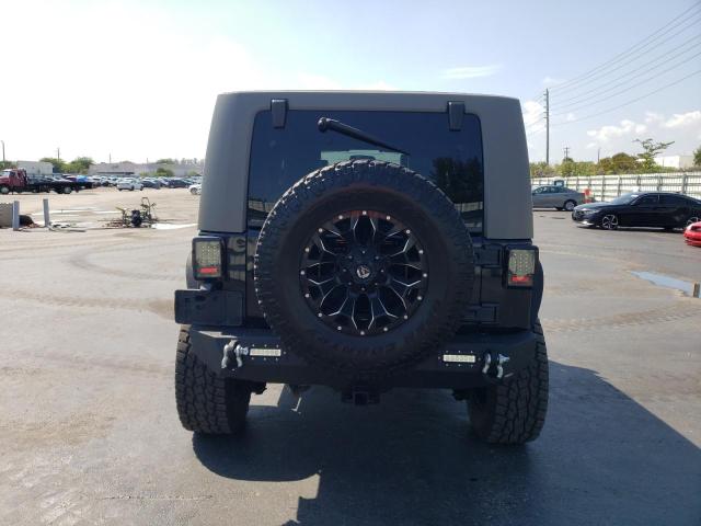 1J4HA5H17AL156590 - 2010 JEEP WRANGLER U SAHARA BLACK photo 6