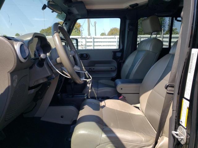 1J4HA5H17AL156590 - 2010 JEEP WRANGLER U SAHARA BLACK photo 7