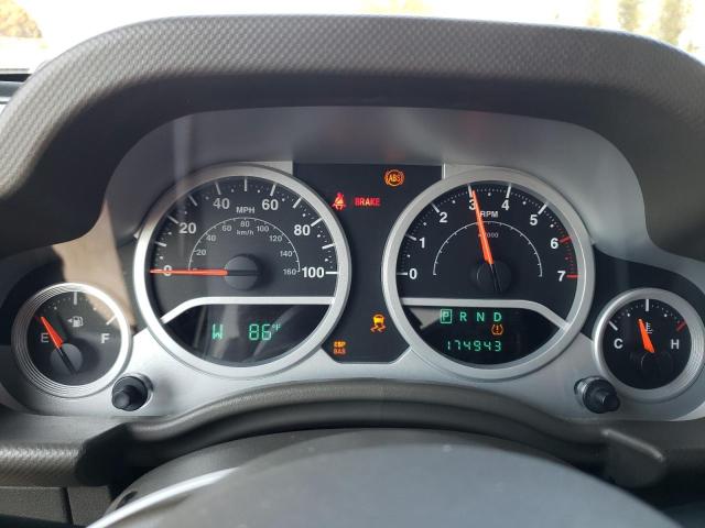 1J4HA5H17AL156590 - 2010 JEEP WRANGLER U SAHARA BLACK photo 9