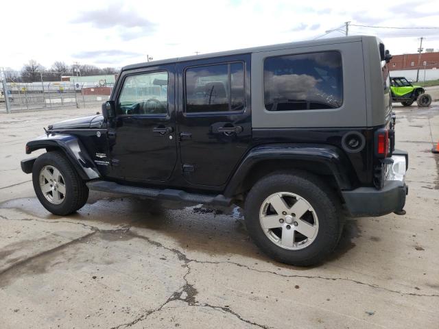 1J4GA59199L732864 - 2009 JEEP WRANGLER U SAHARA BLACK photo 2