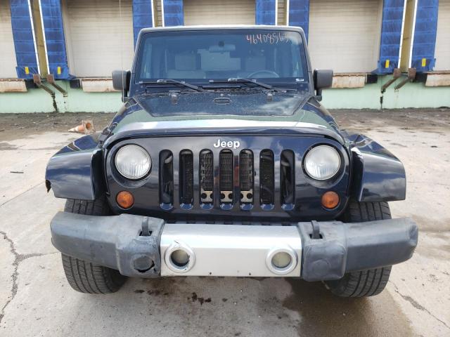 1J4GA59199L732864 - 2009 JEEP WRANGLER U SAHARA BLACK photo 5