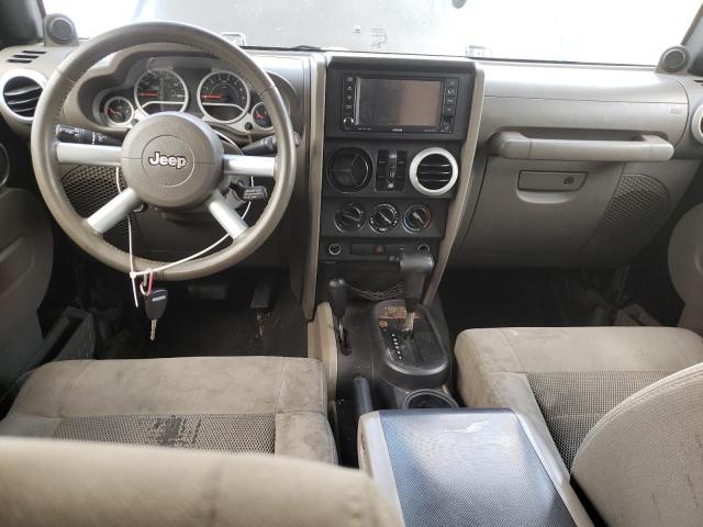 1J4GA59199L732864 - 2009 JEEP WRANGLER U SAHARA BLACK photo 8