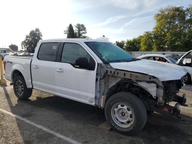 1FTEW1EP3JFE11729 - 2018 FORD F150 SUPERCREW WHITE photo 4