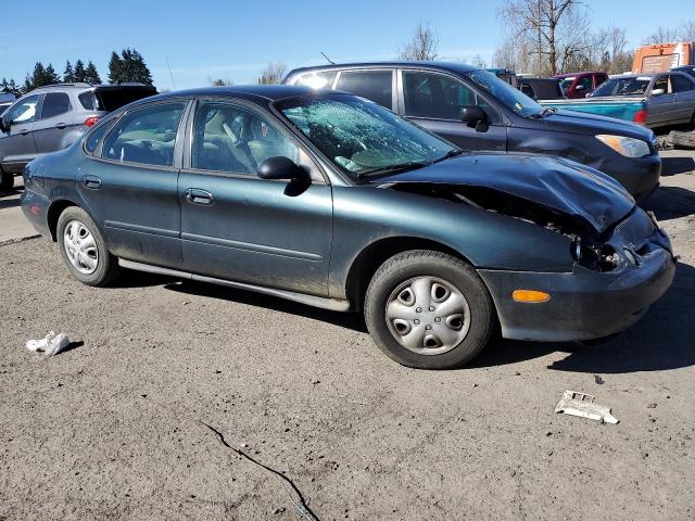 1FAFP52U7XG135390 - 1999 FORD TAURUS LX GREEN photo 4