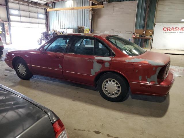 1G3HN52K0V4825634 - 1997 OLDSMOBILE 88 BASE RED photo 2