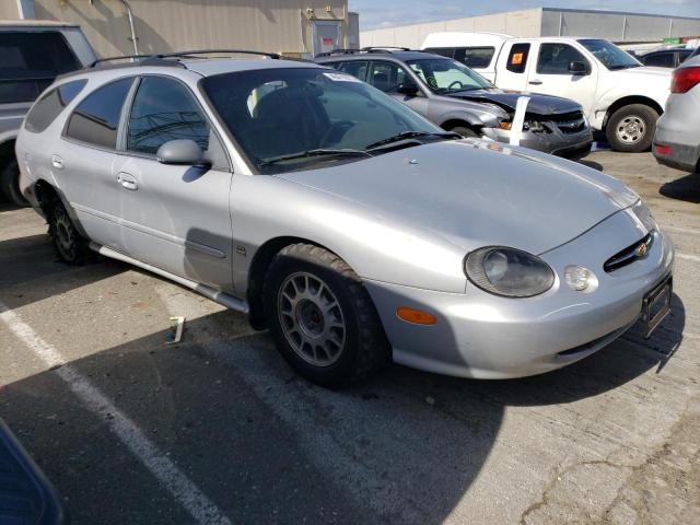 1FAFP58S1XG152112 - 1999 FORD TAURUS SE COMFORT SILVER photo 4