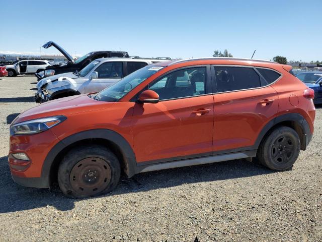 KM8J33A21HU394962 - 2017 HYUNDAI TUCSON LIMITED ORANGE photo 1