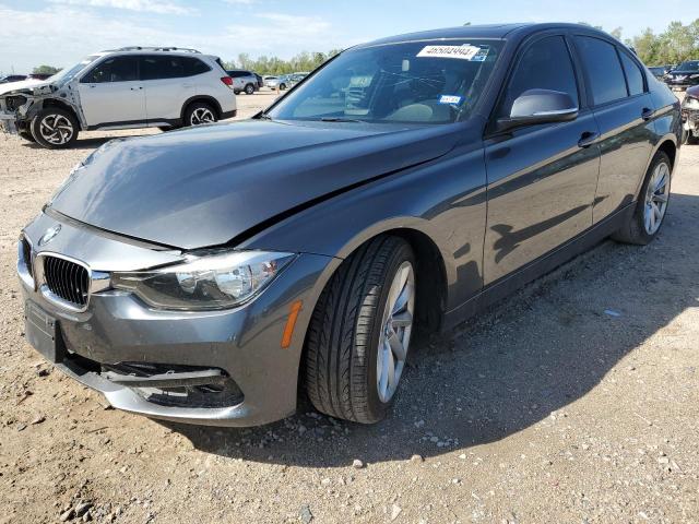 WBA8E5G51HNU22891 - 2017 BMW 320 XI CHARCOAL photo 1