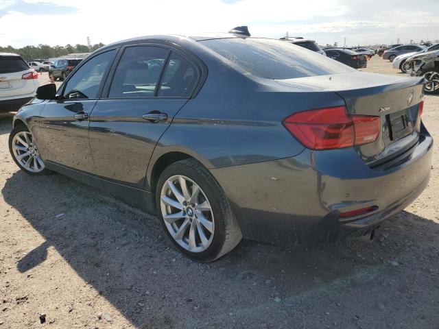 WBA8E5G51HNU22891 - 2017 BMW 320 XI CHARCOAL photo 2