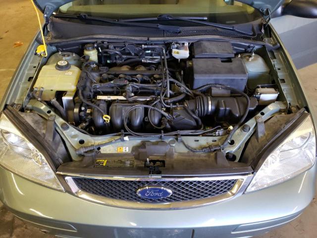 1FAFP34N45W312426 - 2005 FORD FOCUS ZX4 GRAY photo 11