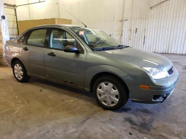 1FAFP34N45W312426 - 2005 FORD FOCUS ZX4 GRAY photo 4