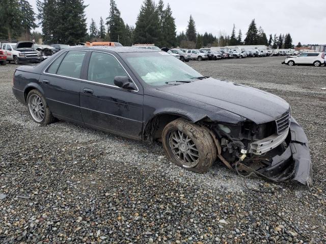 1G6KY5497YU166384 - 2000 CADILLAC SEVILLE STS BLACK photo 4