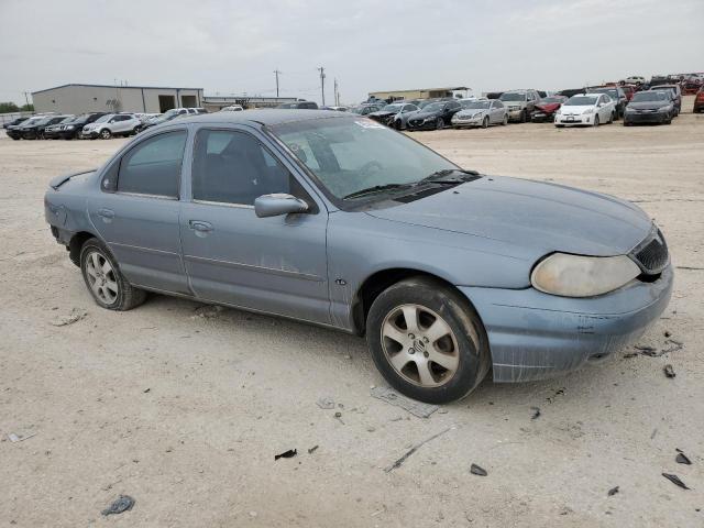 1MEFM66L3YK614932 - 2000 MERCURY MYSTIQUE LS BLUE photo 4