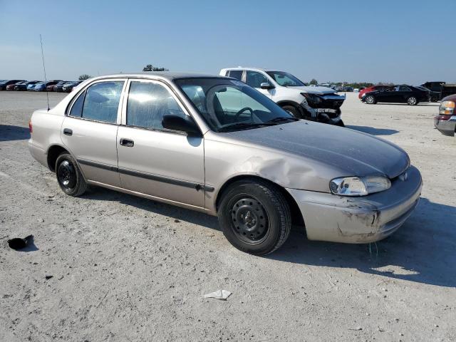 1Y1SK5289XZ434969 - 1999 CHEVROLET GEO PRIZM BASE SILVER photo 4