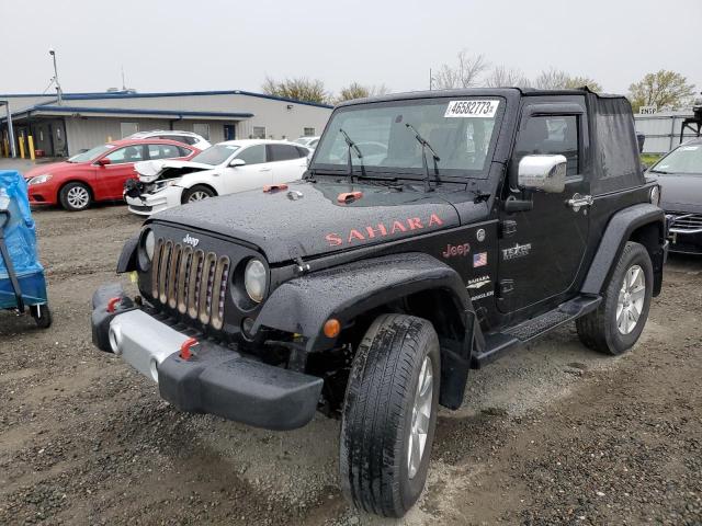 1J4FA54118L569452 - 2008 JEEP WRANGLER SAHARA BLACK photo 1