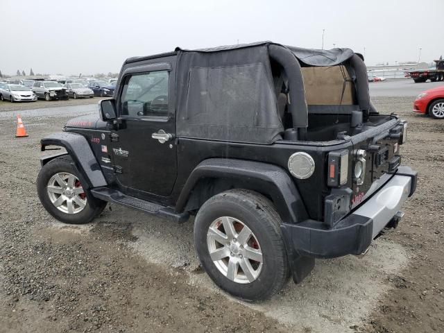 1J4FA54118L569452 - 2008 JEEP WRANGLER SAHARA BLACK photo 2