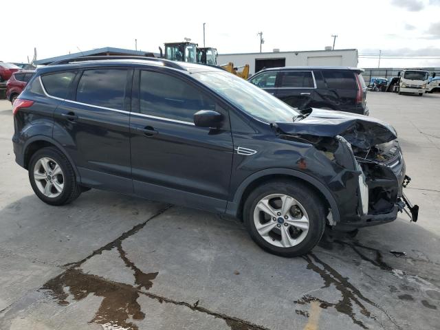 1FMCU0G98FUC04001 - 2015 FORD ESCAPE SE BLACK photo 4