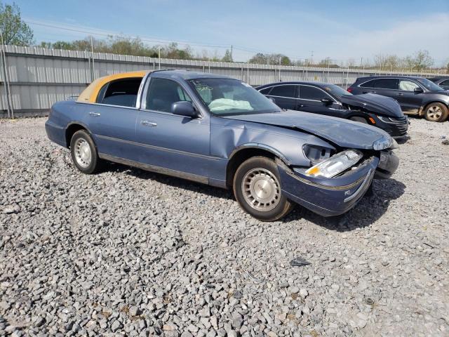 1LNHM81W4XY660963 - 1999 LINCOLN TOWN CAR EXECUTIVE BLUE photo 4
