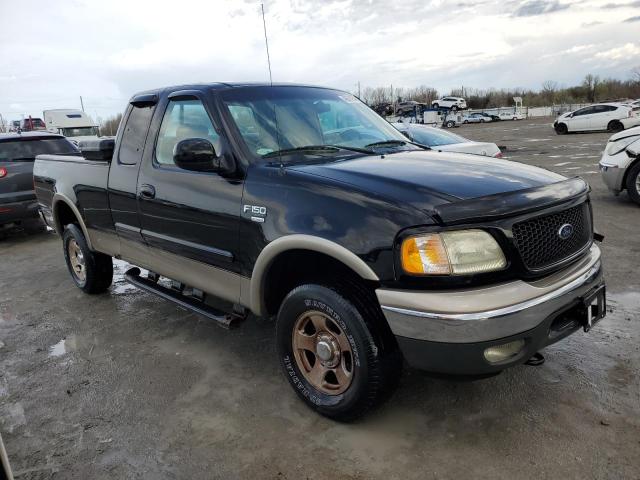 1FTRX18W52NA68575 - 2002 FORD F150 BLACK photo 4