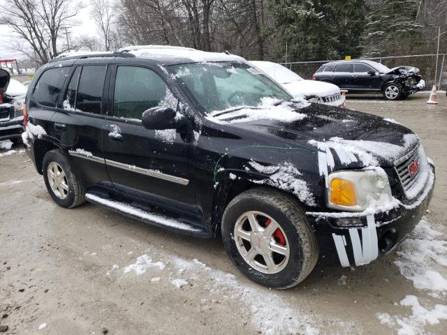 1GKDT33S592102231 - 2009 GMC ENVOY SLE BLACK photo 4