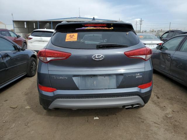 KM8J3CA21JU643833 - 2018 HYUNDAI TUCSON VALUE BLUE photo 6