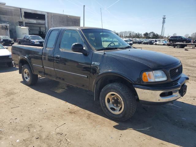 1FTDX18W6VNC06803 - 1997 FORD F-150 BLACK photo 4