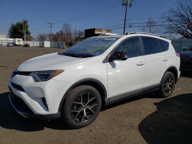 JTMJFREV6GJ061370 - 2016 TOYOTA RAV4 SE WHITE photo 1