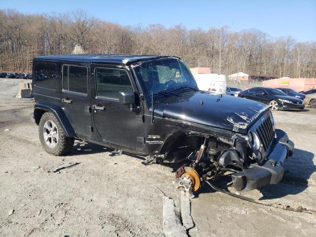 1C4HJWEG4GL307687 - 2016 JEEP WRANGLER U SAHARA BLACK photo 4
