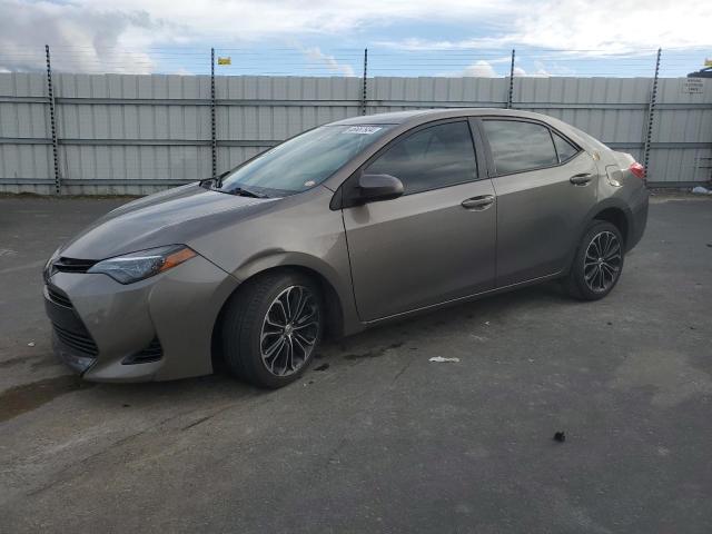 5YFBURHE4HP593087 - 2017 TOYOTA COROLLA L BROWN photo 1