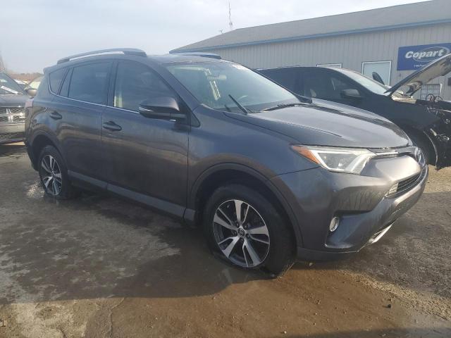 JTMWFREV6GJ097050 - 2016 TOYOTA RAV4 XLE GRAY photo 4