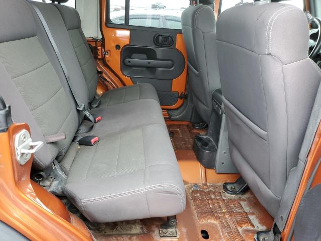 1J4HA3H19AL190082 - 2010 JEEP WRANGLER U SPORT ORANGE photo 10