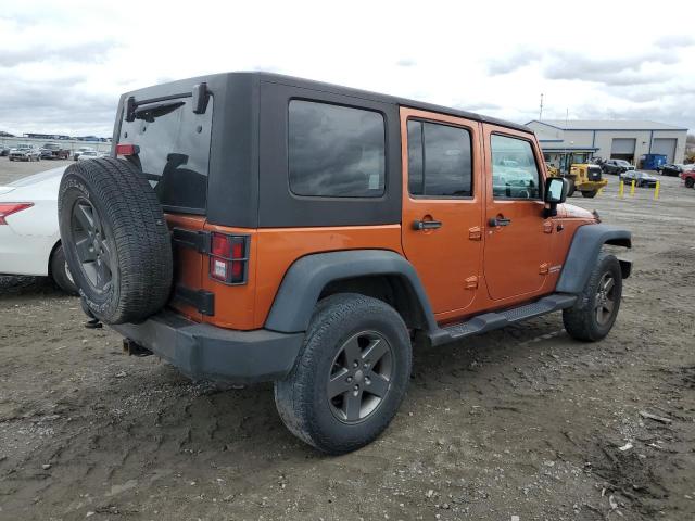 1J4HA3H19AL190082 - 2010 JEEP WRANGLER U SPORT ORANGE photo 3