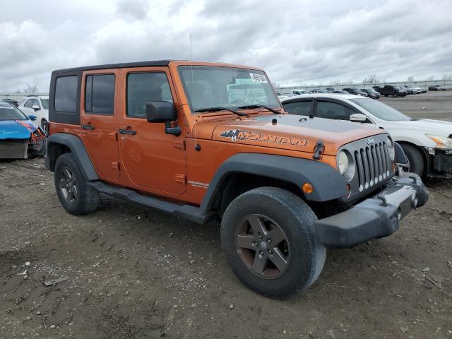 1J4HA3H19AL190082 - 2010 JEEP WRANGLER U SPORT ORANGE photo 4