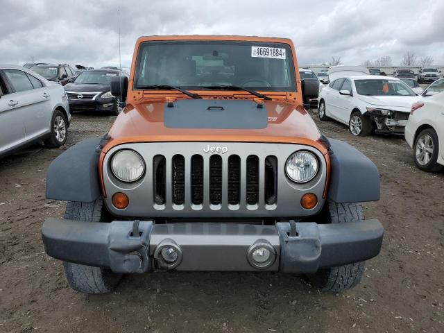 1J4HA3H19AL190082 - 2010 JEEP WRANGLER U SPORT ORANGE photo 5