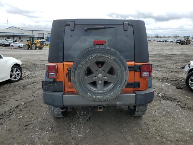 1J4HA3H19AL190082 - 2010 JEEP WRANGLER U SPORT ORANGE photo 6