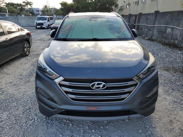 KM8J33A2XJU640865 - 2018 HYUNDAI TUCSON VALUE GRAY photo 5