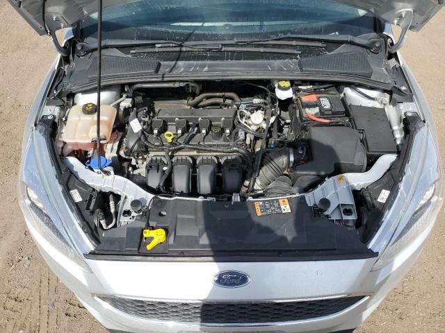 1FADP3F28JL329042 - 2018 FORD FOCUS SE SILVER photo 11